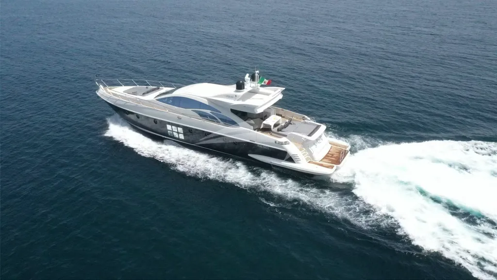 Alt Text: Azimut 86 Charter Porto Cervo luxury yacht cruising Costa Smeralda