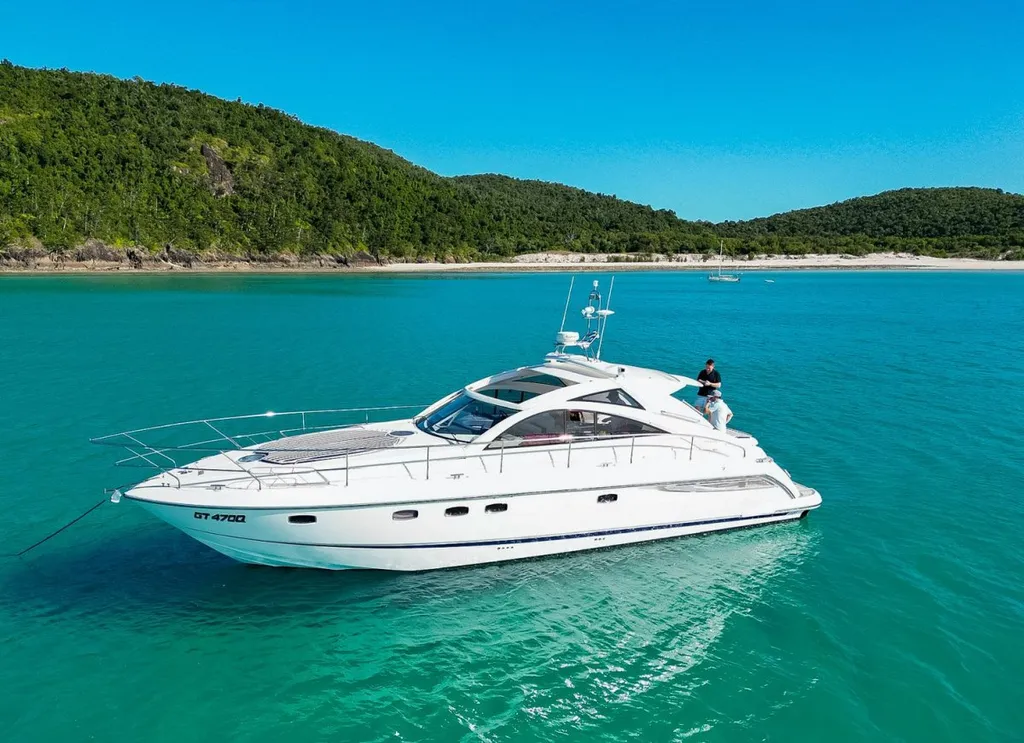 Fairline Targa 47 GT yacht charter anchored in turquoise waters Porto Cervo Sardinia