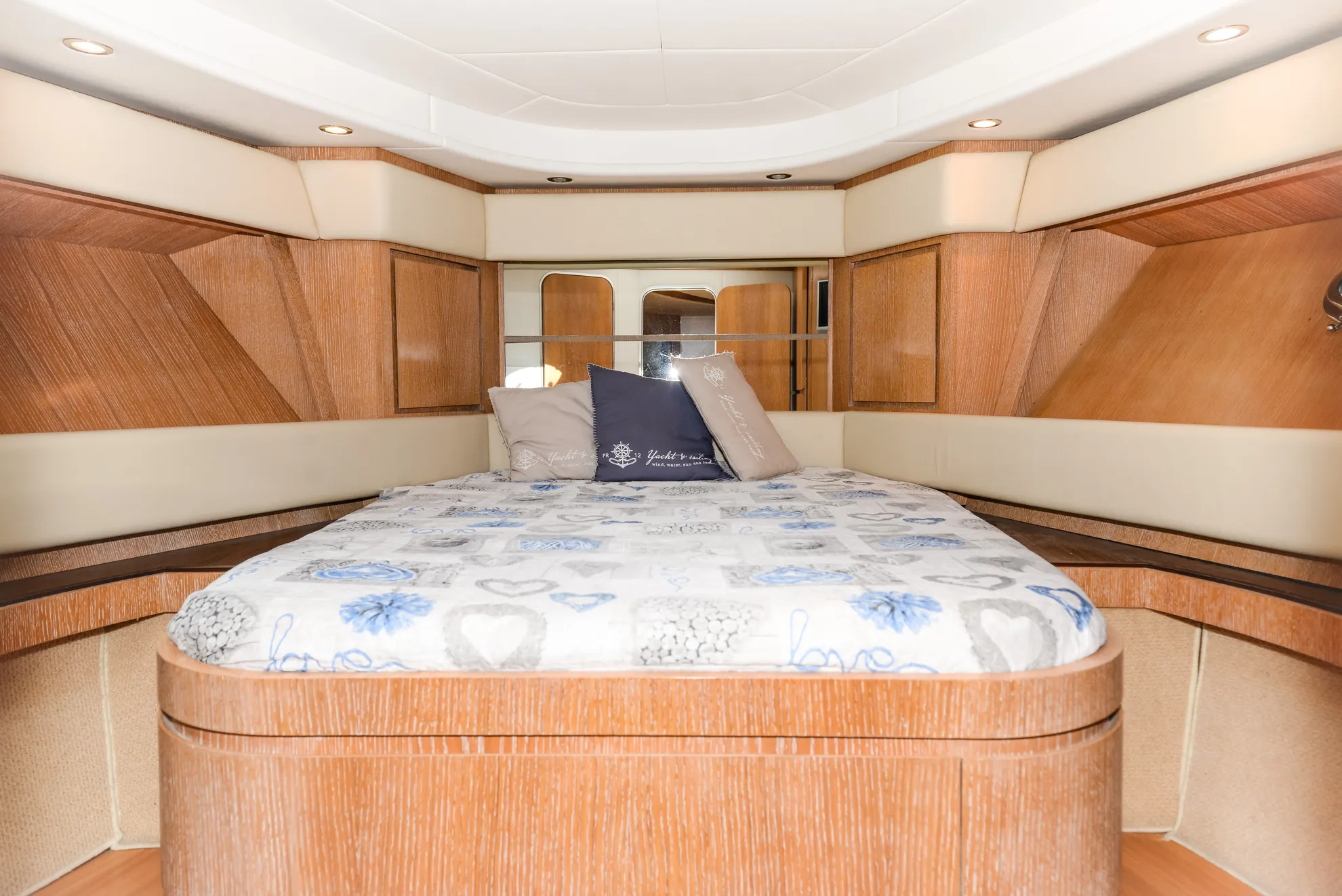 Rizzardi 45 yacht rental speeding across Mediterranean waters Sardinia at golden hour